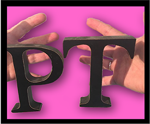 Hands holding the letters P and T.